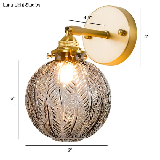 Textured Glass Ball Wall Light With Elegant Gold Mount And Adjustable Joint