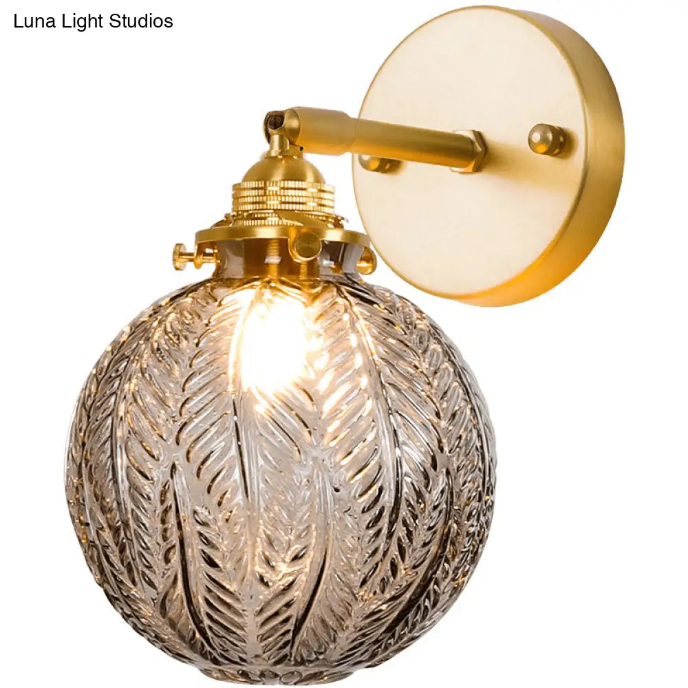 Textured Glass Ball Wall Light With Elegant Gold Mount And Adjustable Joint