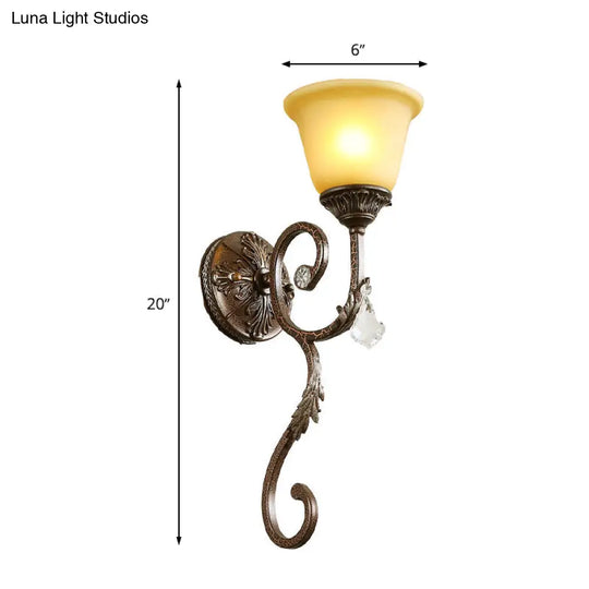 Traditional Amber Glass Sconce Lamp With Swirled Arm - Wall Mounted Corner Fixture In Bronze