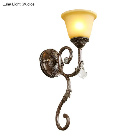 Traditional Amber Glass Sconce Lamp With Swirled Arm - Wall Mounted Corner Fixture In Bronze