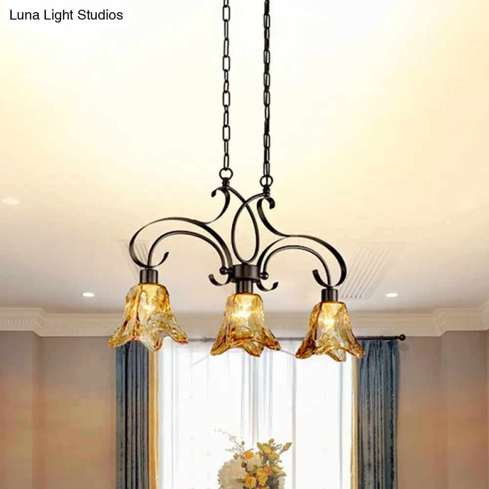 Traditional Black Island Lamp With Amber Glass Floral Design And 3 Down Lighting Pendants For Dining