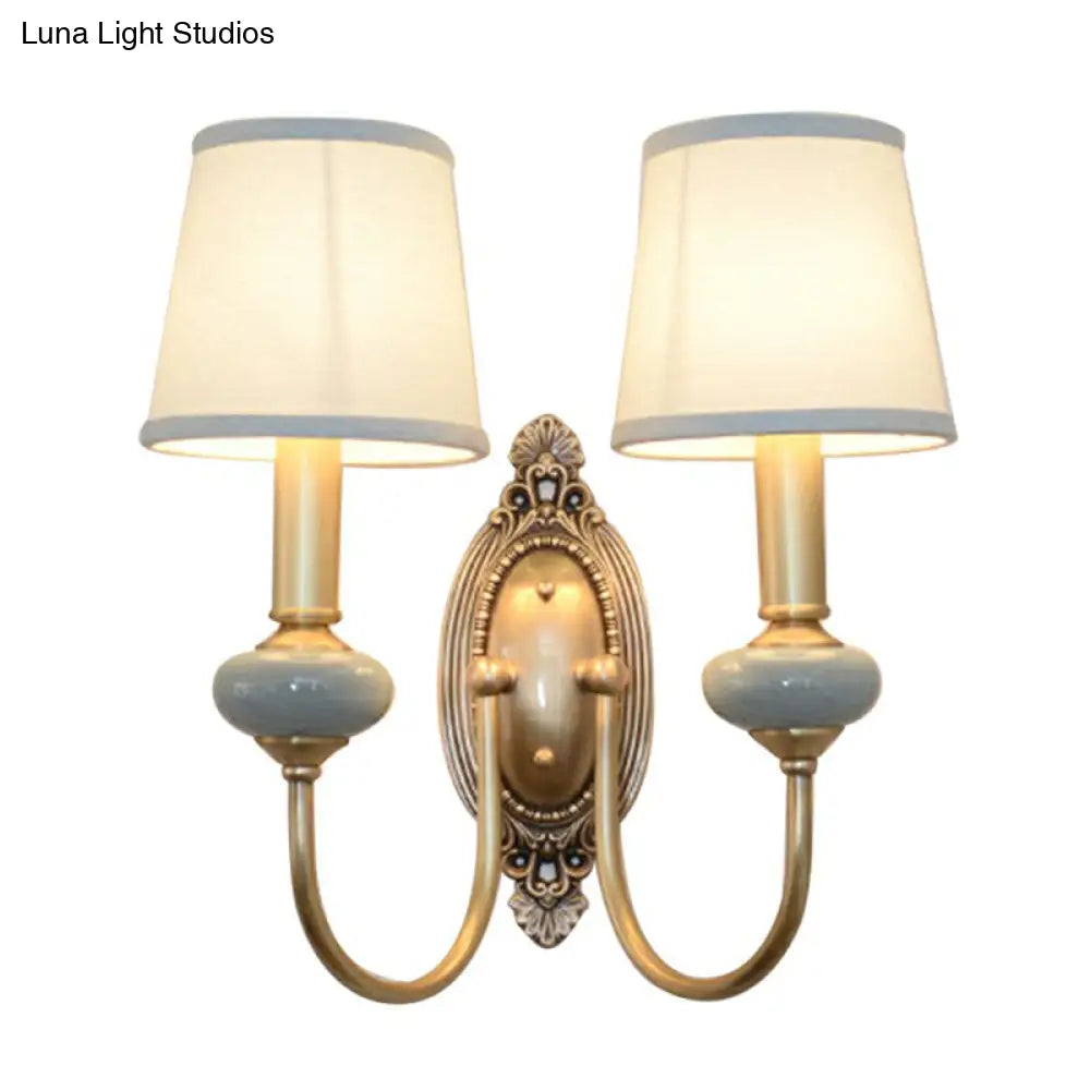 Traditional Brass Swoop Arm Living Room Sconce Light With Tapered Fabric Shade