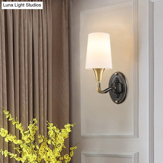 Traditional Brass Wall Sconce With Frosted Glass Shade - Elegant Tapered Design For Corridor