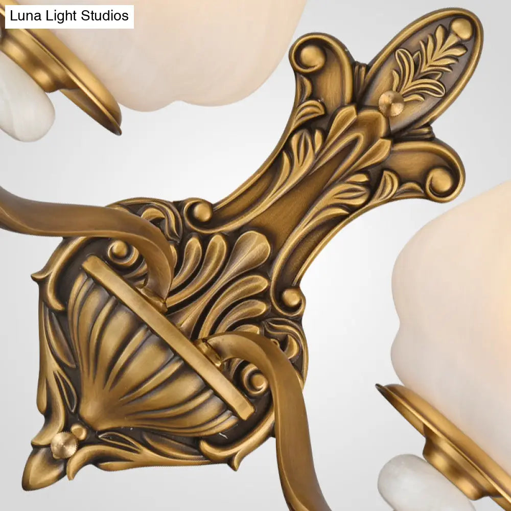 Traditional Brass Wall Sconce With Frosted Glass Shade Half Head Design