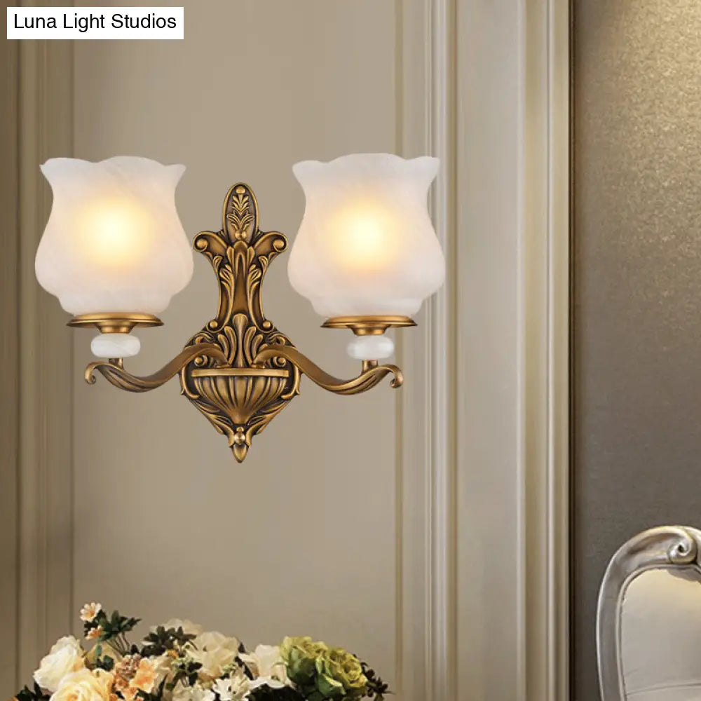 Traditional Brass Wall Sconce With Frosted Glass Shade Half Head Design