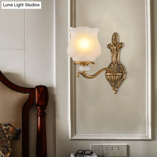 Traditional Brass Wall Sconce With Frosted Glass Shade Half Head Design