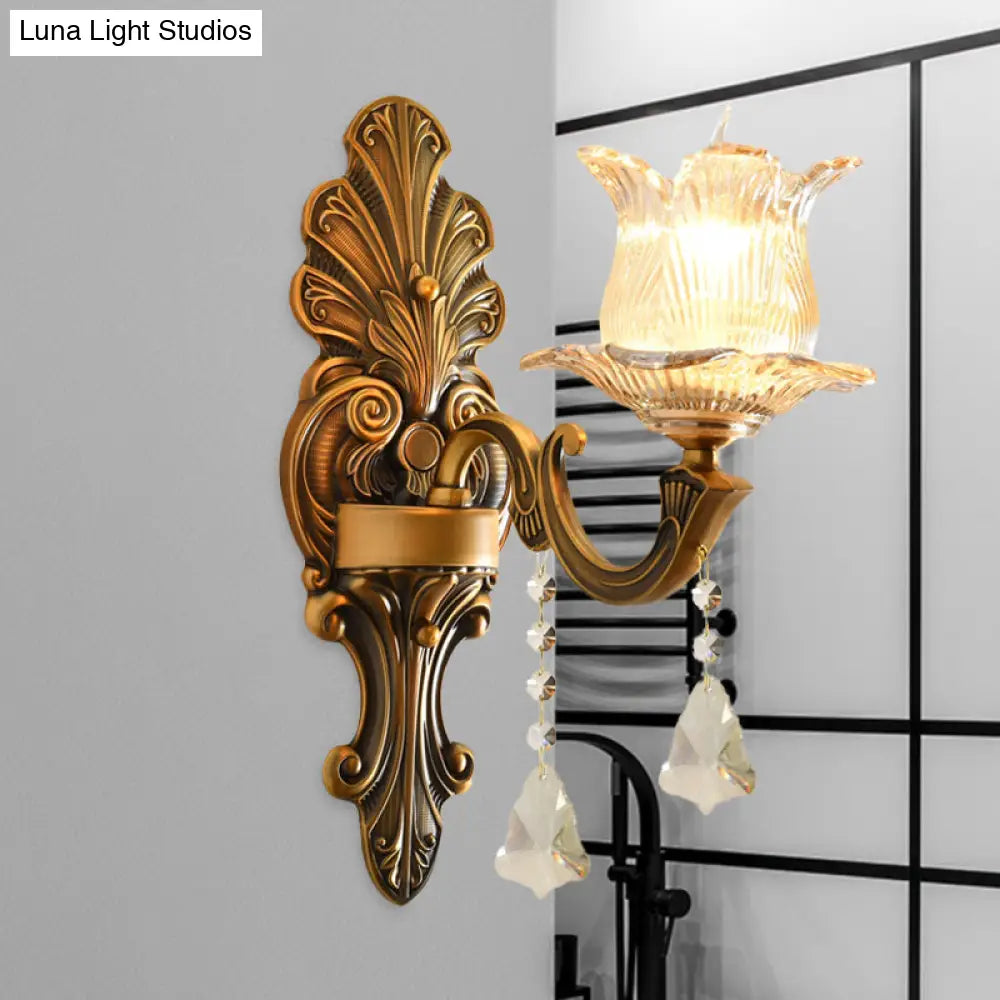 Traditional Brass Wall Sconce With Ribbed Glass And Floral Design