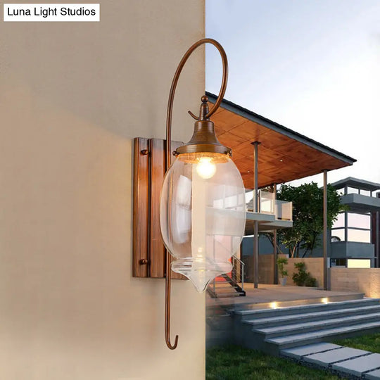 Traditional Brown Glass Bottle Sconce - Outdoor Wall Lighting With Clear 1-Light Fixture