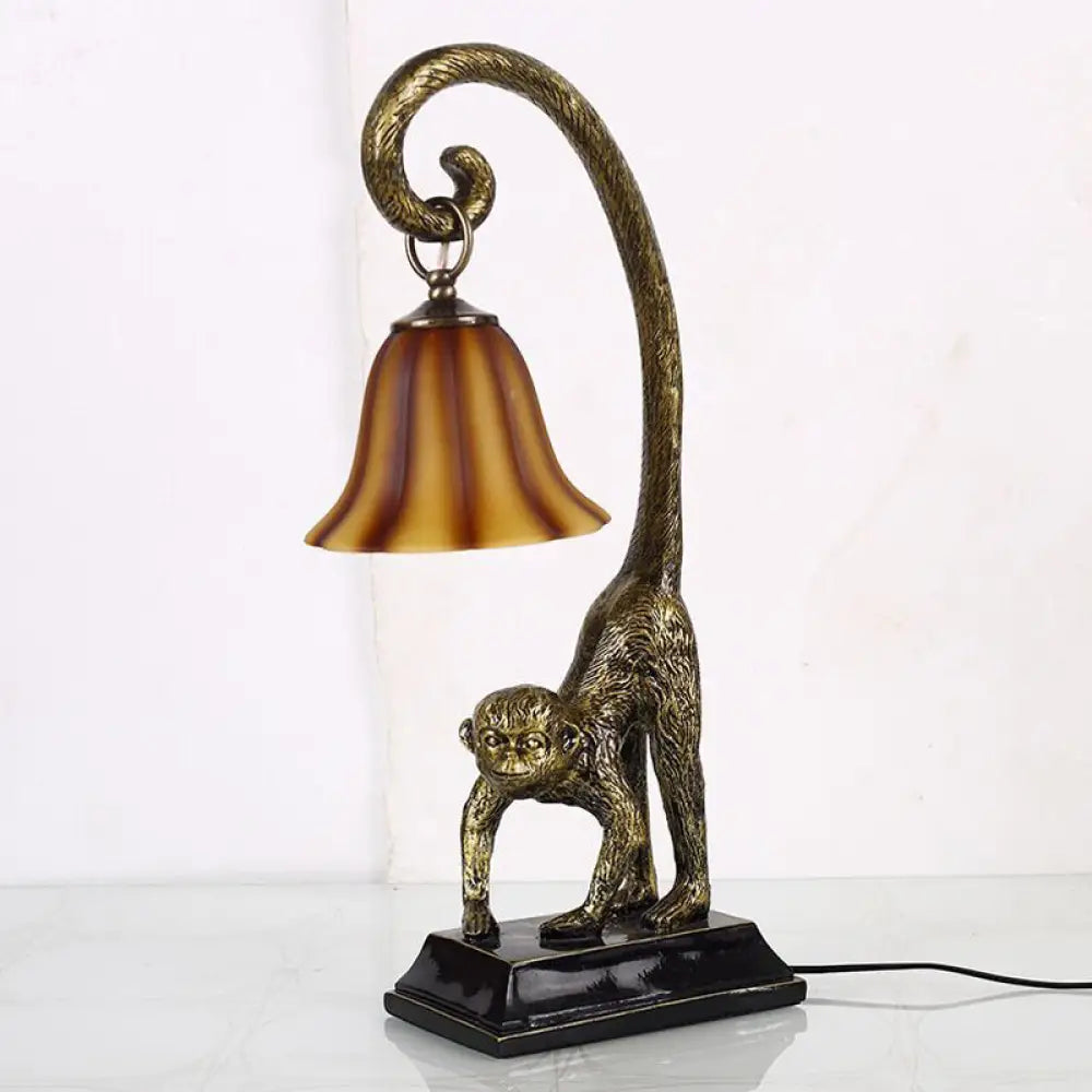 Traditional Brown Glass Carillon Nightstand Light With Monkey Base In Bronze