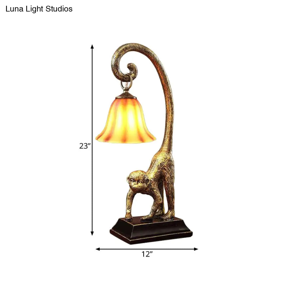 Traditional Brown Glass Carillon Nightstand Light With Monkey Base In Bronze