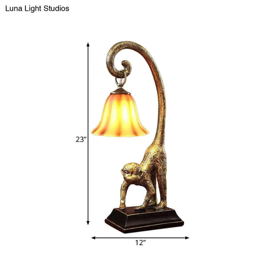 Traditional Brown Glass Carillon Nightstand Light With Monkey Base In Bronze