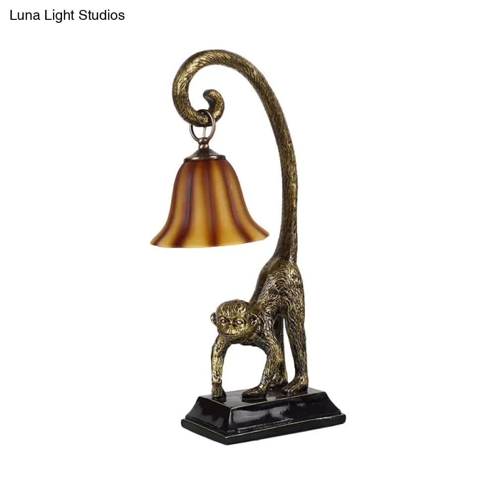 Traditional Brown Glass Carillon Nightstand Light With Monkey Base In Bronze