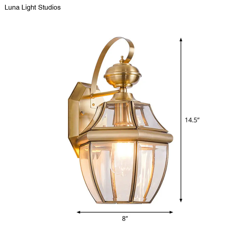 Traditional Clear Glass Globe Wall Light - 1-Light Outdoor Lantern Sconce In Brass