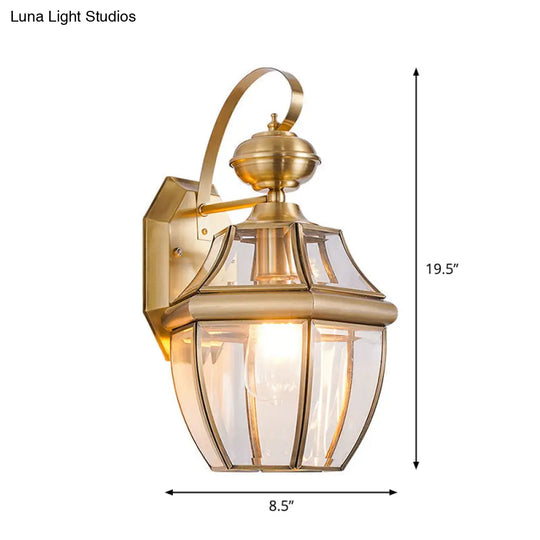 Traditional Clear Glass Globe Wall Light - 1-Light Outdoor Lantern Sconce In Brass