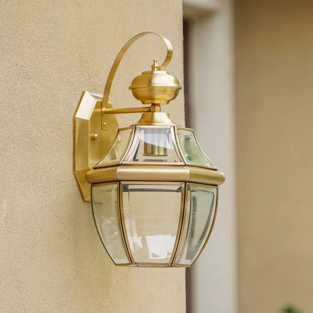 Traditional Clear Glass Globe Wall Light - 1-Light Outdoor Lantern Sconce In Brass / Small