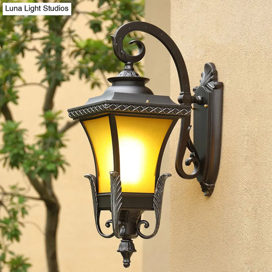 Traditional Coffee Square Bell Outdoor Wall Light Fixture With Tan Glass Mount - 1 Head