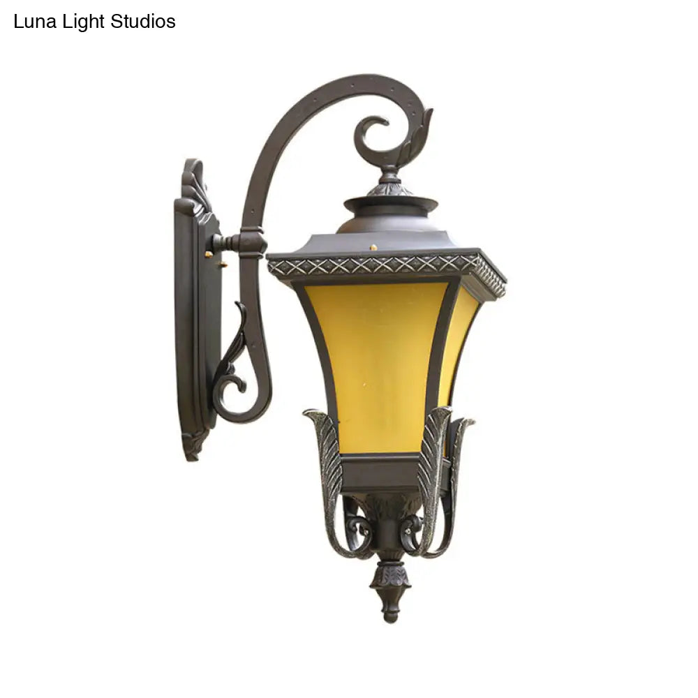 Traditional Coffee Square Bell Outdoor Wall Light Fixture With Tan Glass Mount - 1 Head