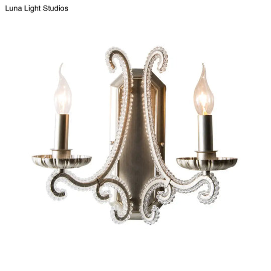 Traditional Crystal Strand Wall Mounted Bedroom Light With Silver Candelabra Design