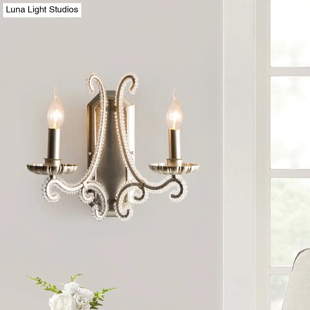 Traditional Crystal Strand Wall Mounted Bedroom Light With Silver Candelabra Design