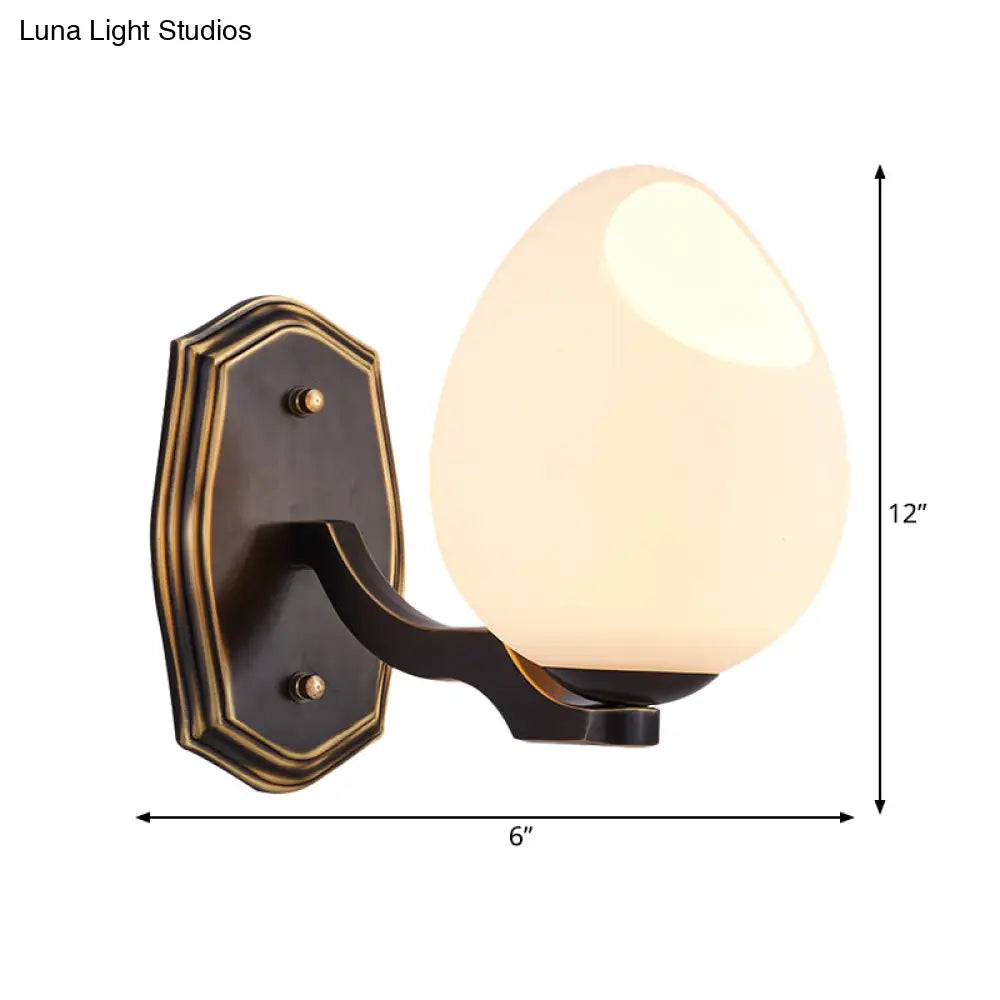 Traditional Egg-Shaped Wall Sconce With Frosted Glass Lamp In Black - 1 Light