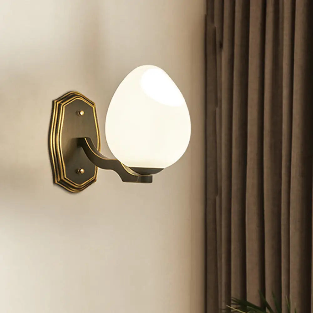 Traditional Egg-Shaped Wall Sconce With Frosted Glass Lamp In Black - 1 Light