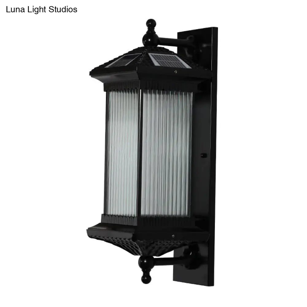 Traditional Glass Led Outdoor Wall Light With Solar Power And Ribbed Design.