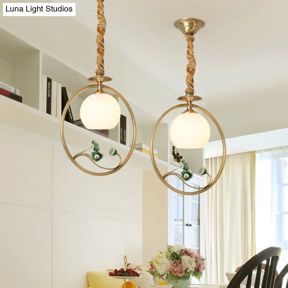 Traditional Gold & White Glass Pendulum Light With Globe Head Lotus Decor And Suspension Ring