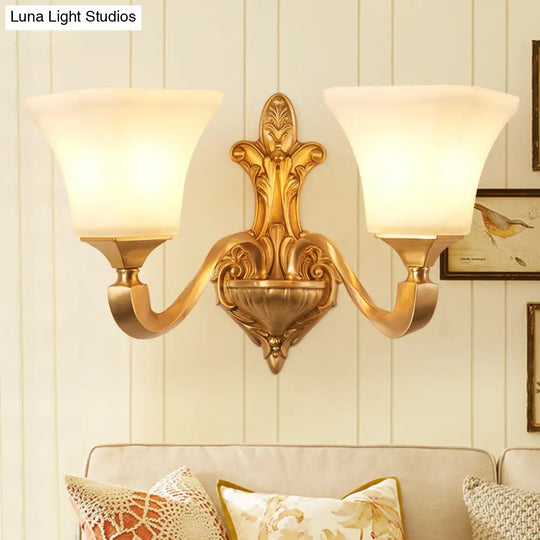 Traditional Half-Bulb Brass Wall Sconce With Bell Shade & Frosted Glass