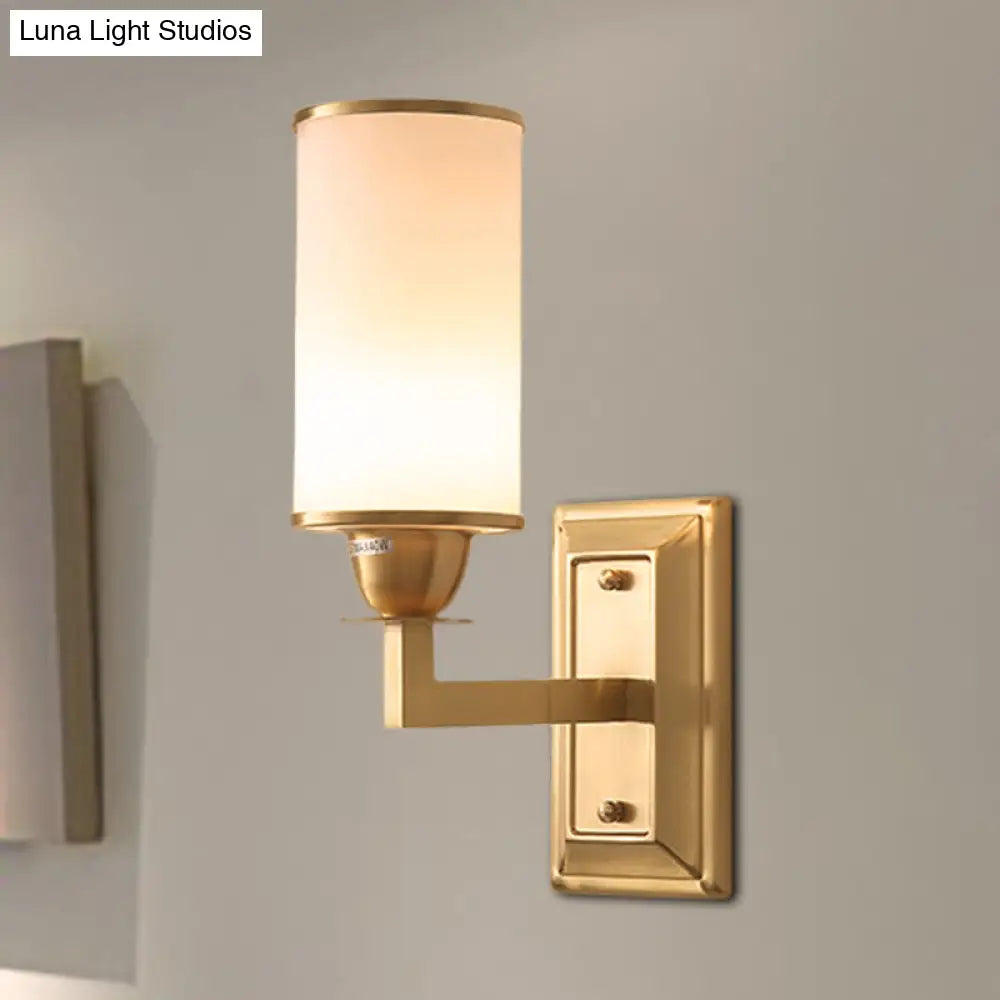 Traditional Metal Wall Lamp With Brass Sconce And Cylinder White Glass Shade