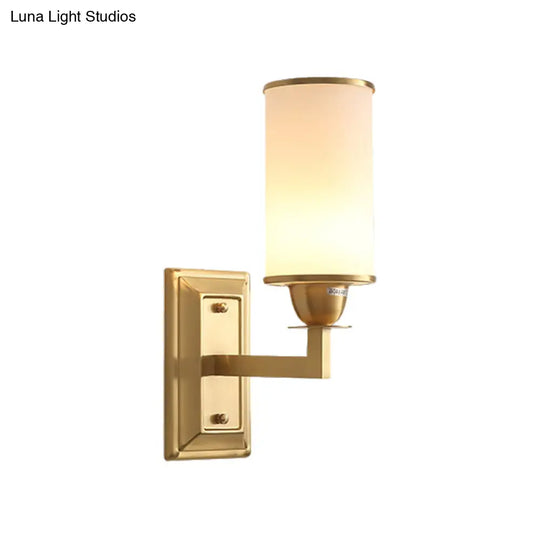 Traditional Metal Wall Lamp With Brass Sconce And Cylinder White Glass Shade