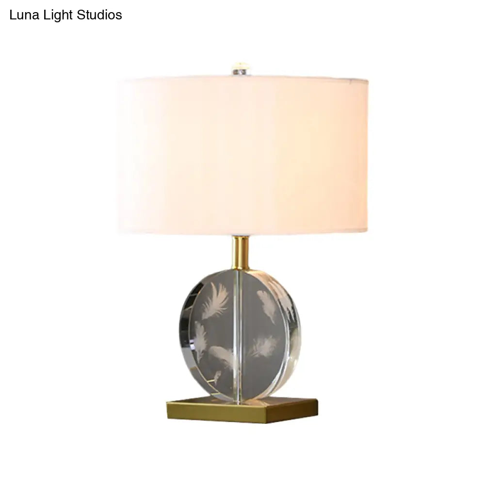 Traditional Nightstand Lamp With White Fabric Cylinder Shade And Clear Circular Crystal Accent