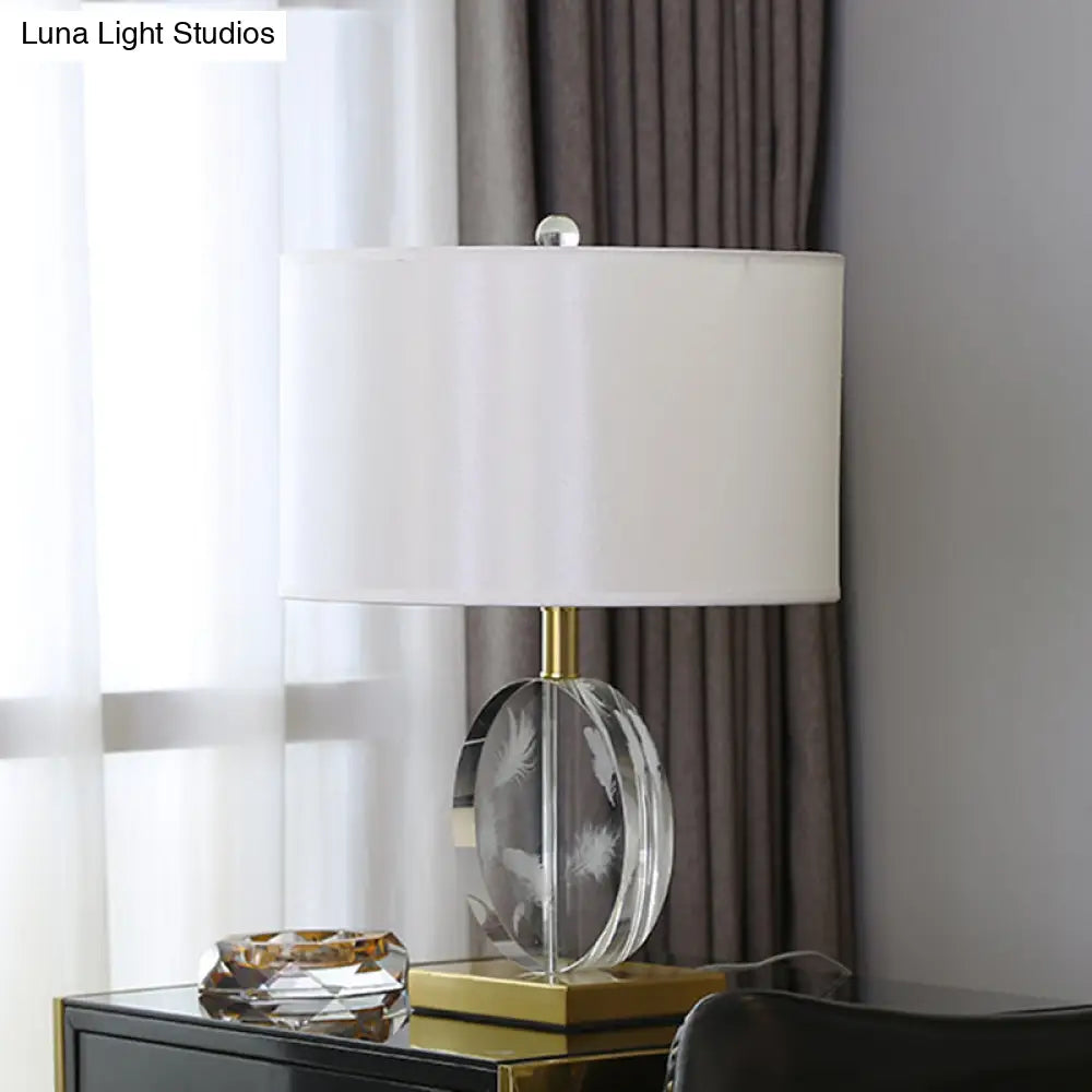 Traditional Nightstand Lamp With White Fabric Cylinder Shade And Clear Circular Crystal Accent