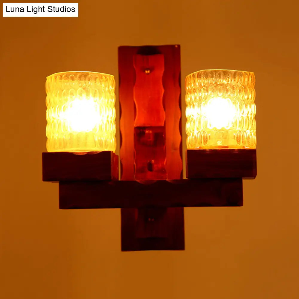 Traditional Red Brown Cylinder Wall Mount Lamp With Glass Dimple And Wood Arm - 1/2-Light Bedroom