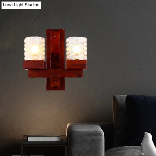 Traditional Red Brown Cylinder Wall Mount Lamp With Glass Dimple And Wood Arm - 1/2-Light Bedroom