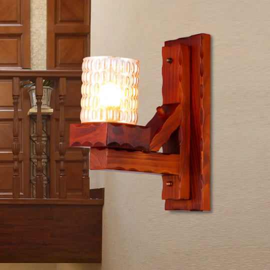 Traditional Red Brown Cylinder Wall Mount Lamp With Glass Dimple And Wood Arm - 1/2-Light Bedroom