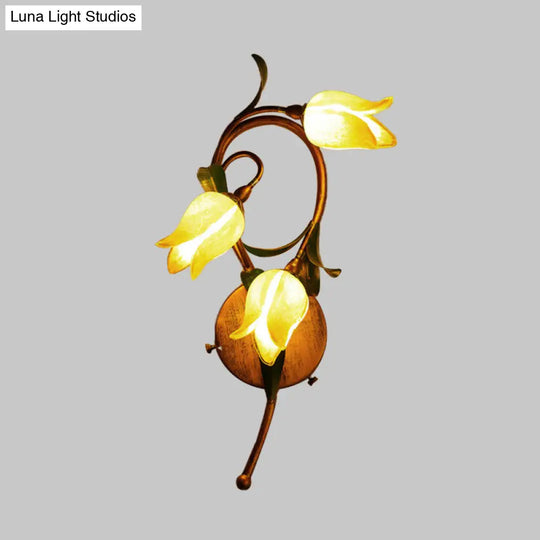 Traditional-Style Yellow Glass 3-Light Brass Bedroom Sconce