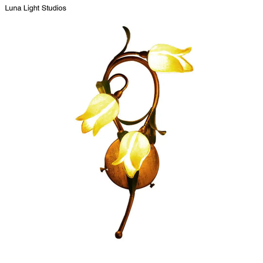 Traditional-Style Yellow Glass 3-Light Brass Bedroom Sconce