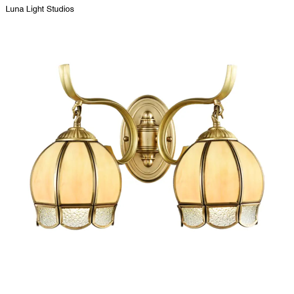 Traditional Tan Glass Brass Finish Sconce Light With Swirl Arm