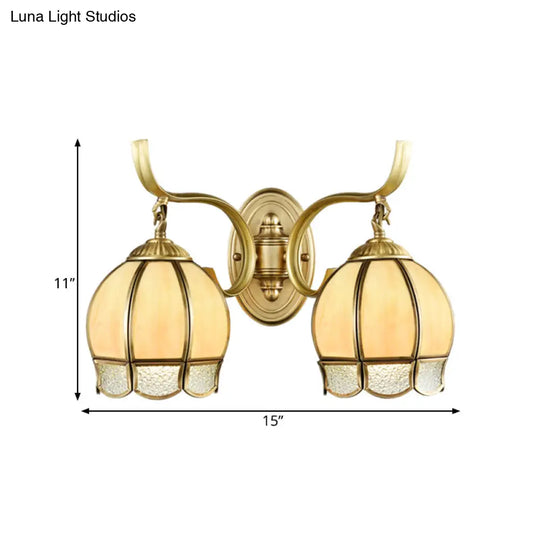 Traditional Tan Glass Brass Finish Sconce Light With Swirl Arm