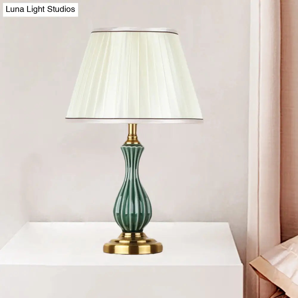 Traditional White Fabric Table Lamp With Ceramic Urn-Shaped Base - Bedroom Nightstand Lighting