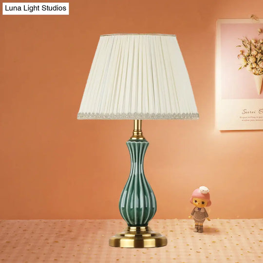 Traditional White Fabric Table Lamp With Ceramic Urn-Shaped Base - Bedroom Nightstand Lighting