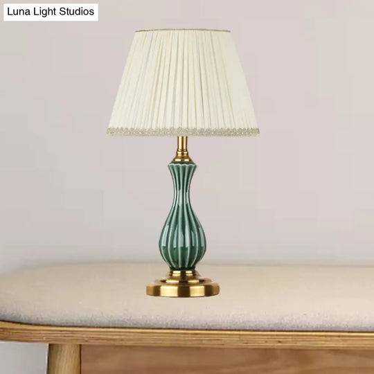 Traditional White Fabric Table Lamp With Ceramic Urn-Shaped Base - Bedroom Nightstand Lighting