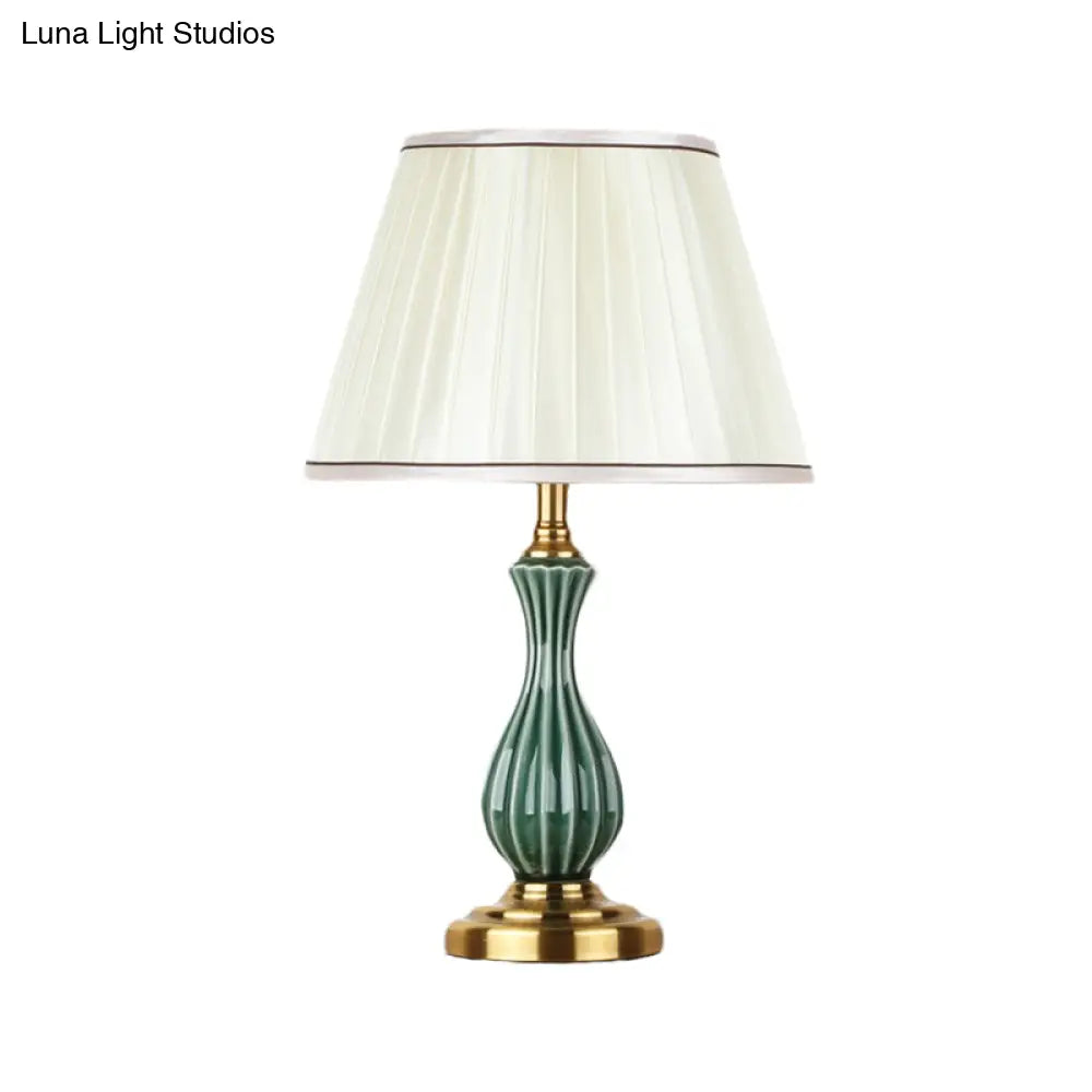 Traditional White Fabric Table Lamp With Ceramic Urn-Shaped Base - Bedroom Nightstand Lighting