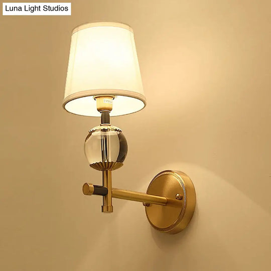 Traditional White Fabric Wall Sconce With Gold Conical Mount Crystal Ball Accent - 1/2 Heads Entry