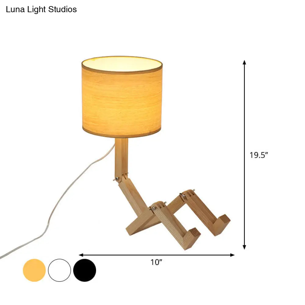 Modern Wood Man-Shaped Table Lamp With Book Rack And Cylinder Fabric Shade - Single