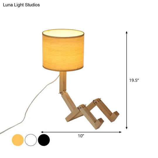 Modern Wood Man-Shaped Table Lamp With Book Rack And Cylinder Fabric Shade - Single