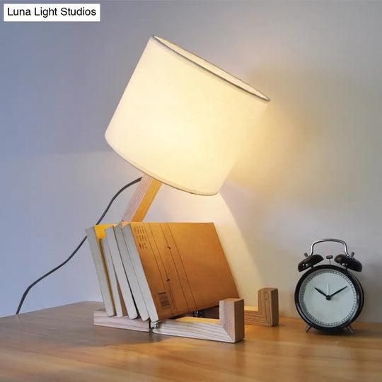 Modern Wood Man-Shaped Table Lamp With Book Rack And Cylinder Fabric Shade - Single