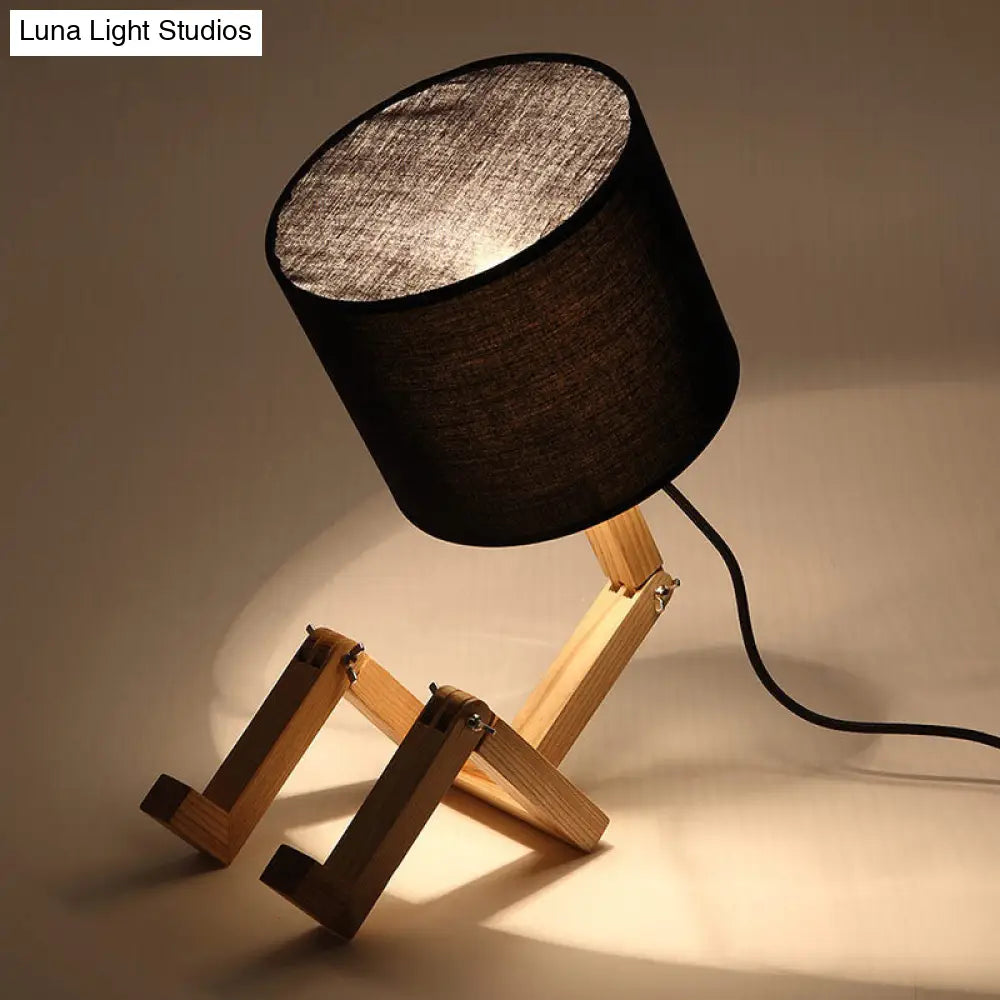 Modern Wood Man-Shaped Table Lamp With Book Rack And Cylinder Fabric Shade - Single