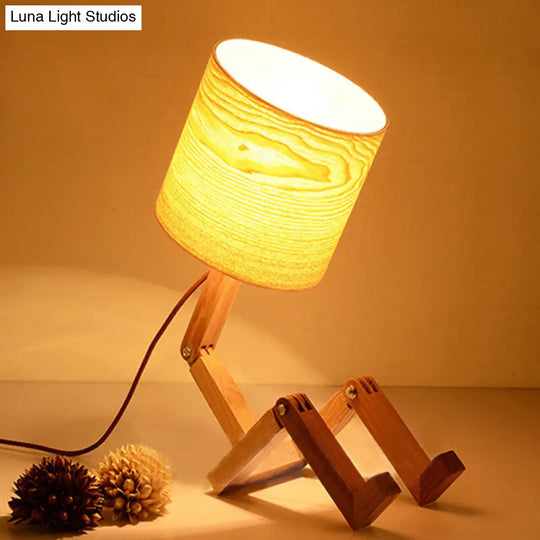 Modern Wood Man-Shaped Table Lamp With Book Rack And Cylinder Fabric Shade - Single