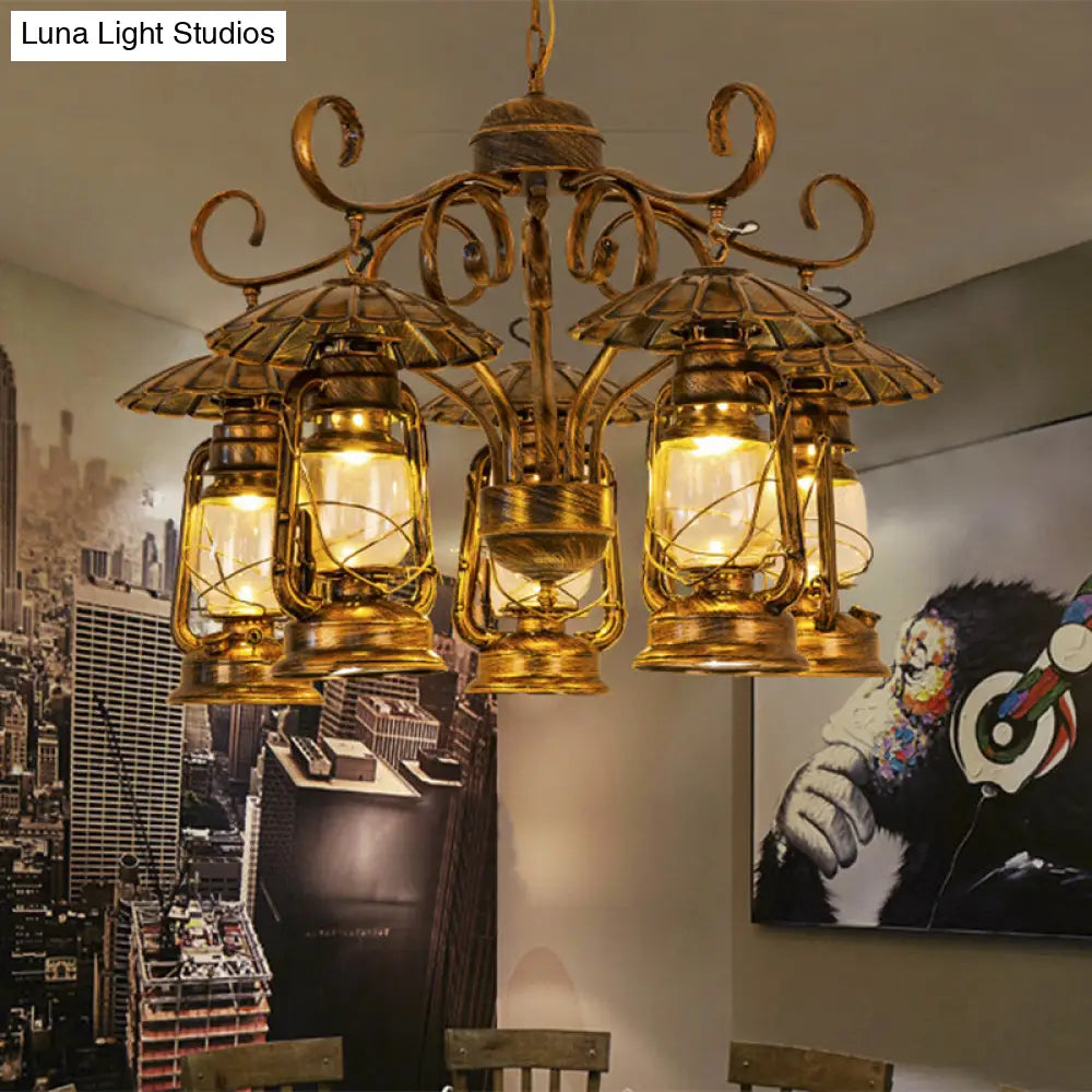 Village Style Metal And Clear Glass 5-Light Aged Brass Lantern Chandelier